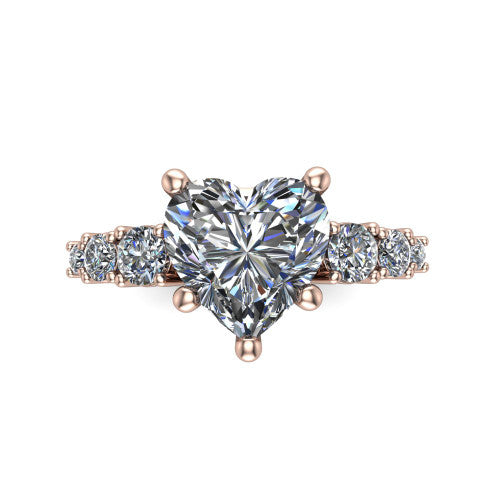 Emery heart accent engagement ring in 18K Rose Gold with graduated round side stones, top-down view of the center and graduated round side accents