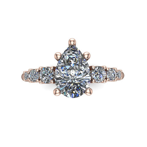 Emery pear accent engagement ring in 14K Rose Gold with graduated round side stones, top-down view of the center and graduated round side accents