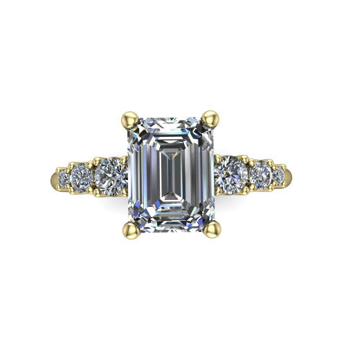 Emery emerald accent engagement ring in 18K Yellow Gold with graduated round side stones, top-down view of the center and graduated round side accents
