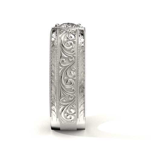 Men’s white gold wedding band featuring scrollwork and diamond center