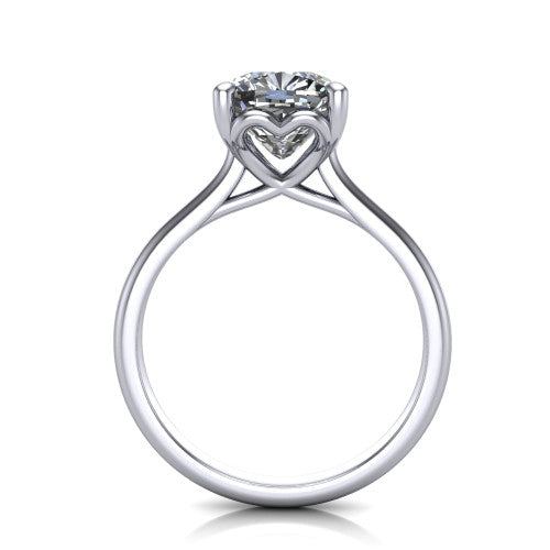 Nevaeh cushion solitaire engagement ring in Platinum with plain band and heart gallery, through-finger front profile showing the heart gallery