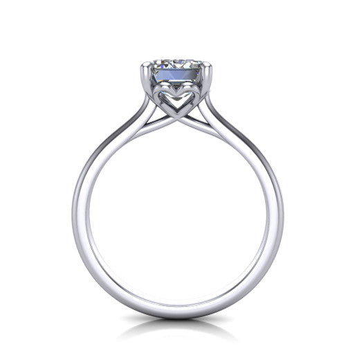 Nevaeh emerald solitaire engagement ring in Platinum with plain band and heart gallery, through-finger front profile showing the heart gallery