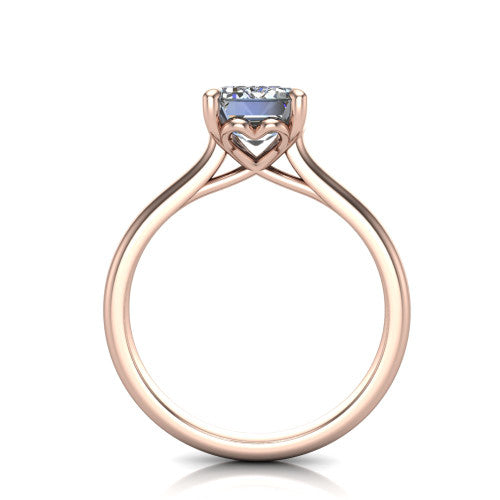 Nevaeh emerald solitaire engagement ring in 14K Rose Gold with plain band and heart gallery, through-finger front profile showing the heart gallery