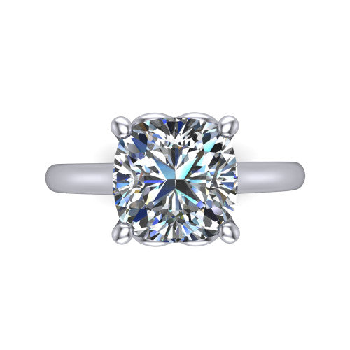 Nevaeh cushion solitaire engagement ring in Platinum with plain band and heart gallery, top-down view of the four-prong center and plain band