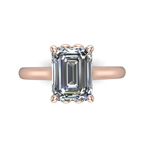 Nevaeh emerald solitaire engagement ring in 18K Rose Gold with plain band and heart gallery, top-down view of the four-prong center and plain band