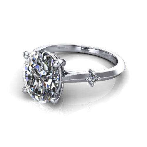 Raelynn oval accent engagement ring in Platinum with kite-set geometric side stones, three-quarter perspective view