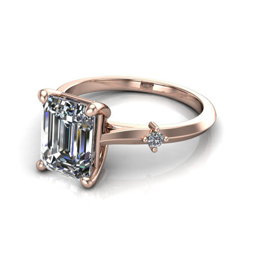 Raelynn emerald accent engagement ring in 14K Rose Gold with kite-set geometric side stones, three-quarter perspective view