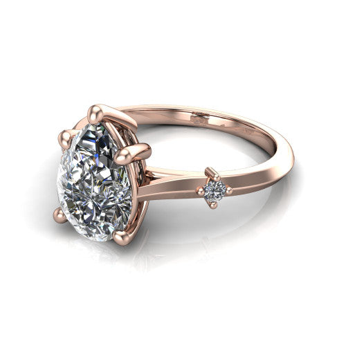 Raelynn pear accent engagement ring in 14K Rose Gold with kite-set geometric side stones, three-quarter perspective view