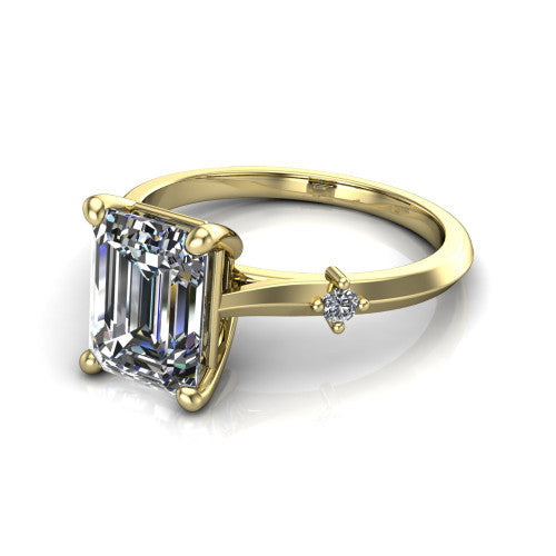 Raelynn emerald accent engagement ring in 14K Yellow Gold with kite-set geometric side stones, three-quarter perspective view