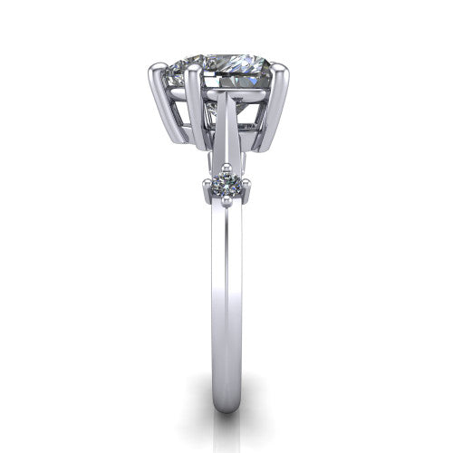 Raelynn heart accent engagement ring in 18K White Gold with kite-set geometric side stones, side profile showing the plain band and kite-set side accent