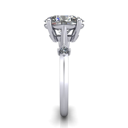 Raelynn oval accent engagement ring in Platinum with kite-set geometric side stones, side profile showing the plain band and kite-set side accent