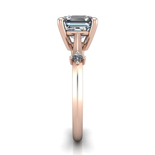 Raelynn asscher accent engagement ring in 14K Rose Gold with kite-set geometric side stones, side profile showing the plain band and kite-set side accent