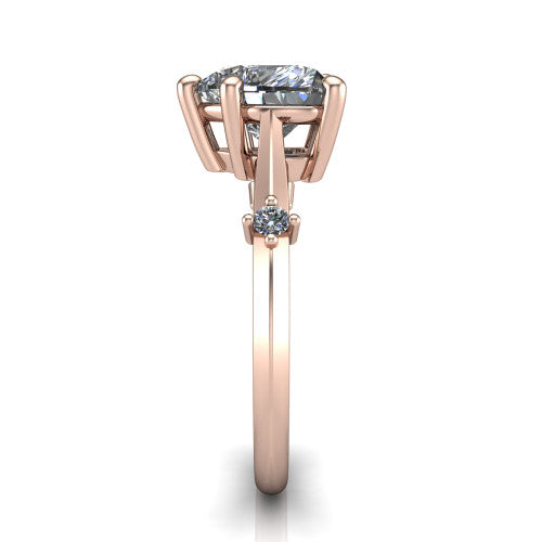 Raelynn heart accent engagement ring in 14K Rose Gold with kite-set geometric side stones, side profile showing the plain band and kite-set side accent
