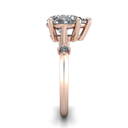 Raelynn pear accent engagement ring in 14K Rose Gold with kite-set geometric side stones, side profile showing the plain band and kite-set side accent