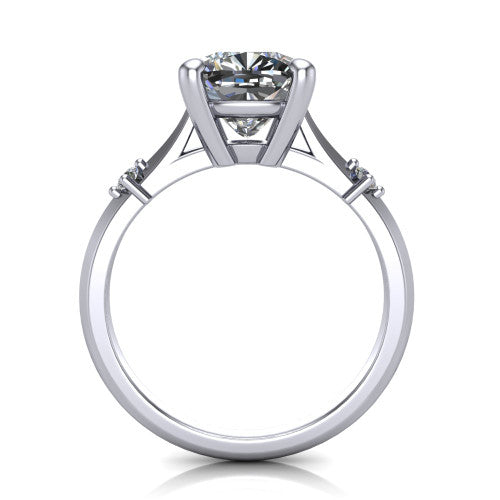 Raelynn cushion accent engagement ring in Platinum with kite-set geometric side stones, through-finger front profile
