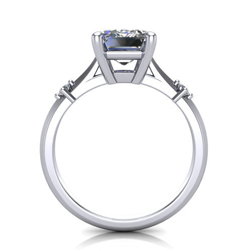 Raelynn emerald accent engagement ring in Platinum with kite-set geometric side stones, through-finger front profile