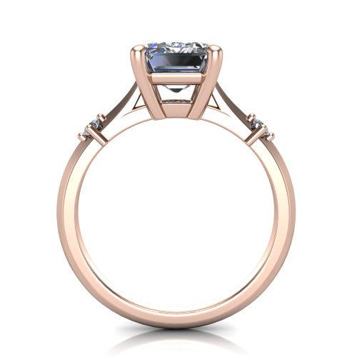 Raelynn emerald accent engagement ring in 14K Rose Gold with kite-set geometric side stones, through-finger front profile