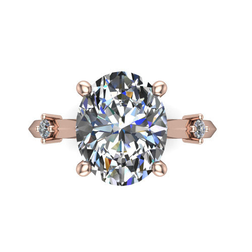 Raelynn oval accent engagement ring in 14K Rose Gold with kite-set geometric side stones, top-down view of the center and geometric side accents