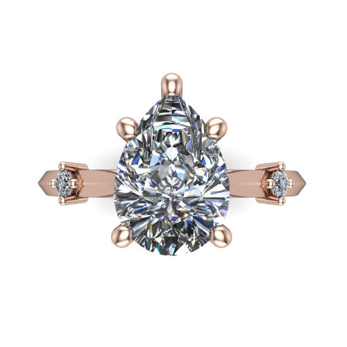 Raelynn pear accent engagement ring in 18K Rose Gold with kite-set geometric side stones, top-down view of the center and geometric side accents