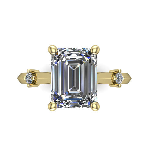 Raelynn emerald accent engagement ring in 18K Yellow Gold with kite-set geometric side stones, top-down view of the center and geometric side accents
