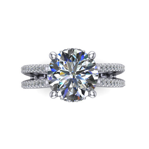 Linda round hidden halo engagement ring in Platinum with pavé split shank, top-down view of the center and pavé split shank
