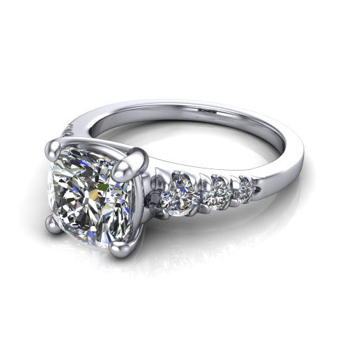 Millie cushion accent engagement ring in Platinum with graduated round side stones, three-quarter perspective view