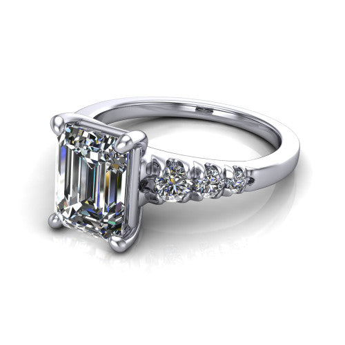 Millie emerald accent engagement ring in 18K White Gold with graduated round side stones, three-quarter perspective view