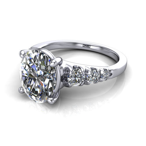 Millie oval accent engagement ring in 14K White Gold with graduated round side stones, three-quarter perspective view