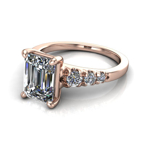 Millie emerald accent engagement ring in 18K Rose Gold with graduated round side stones, three-quarter perspective view