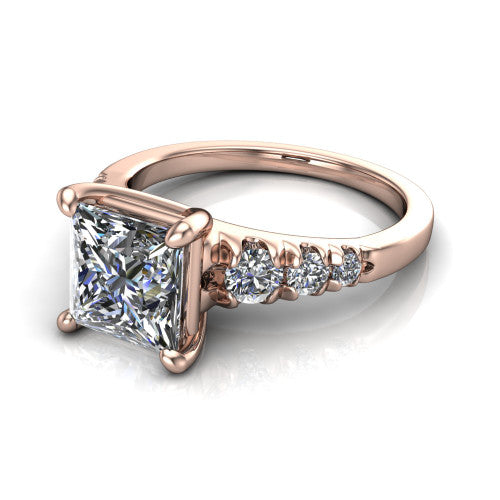 Millie princess accent engagement ring in 14K Rose Gold with graduated round side stones, three-quarter perspective view