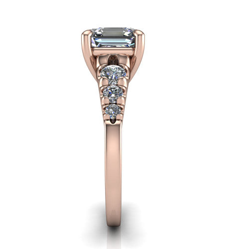 Millie asscher accent engagement ring in 18K Rose Gold with graduated round side stones, side profile showing the graduated side stones and plain band