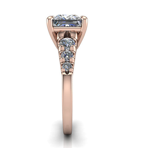 Millie princess accent engagement ring in 18K Rose Gold with graduated round side stones, side profile showing the graduated side stones and plain band