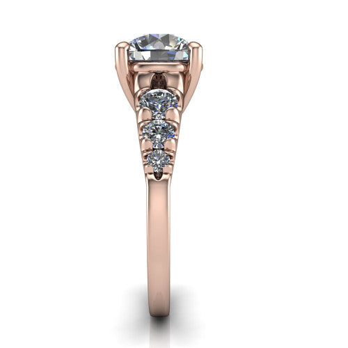 Millie round accent engagement ring in 18K Rose Gold with graduated round side stones, side profile showing the graduated side stones and plain band