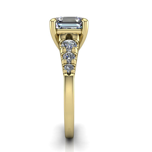 Millie asscher accent engagement ring in 14K Yellow Gold with graduated round side stones, side profile showing the graduated side stones and plain band