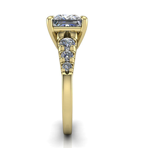 Millie princess accent engagement ring in 14K Yellow Gold with graduated round side stones, side profile showing the graduated side stones and plain band