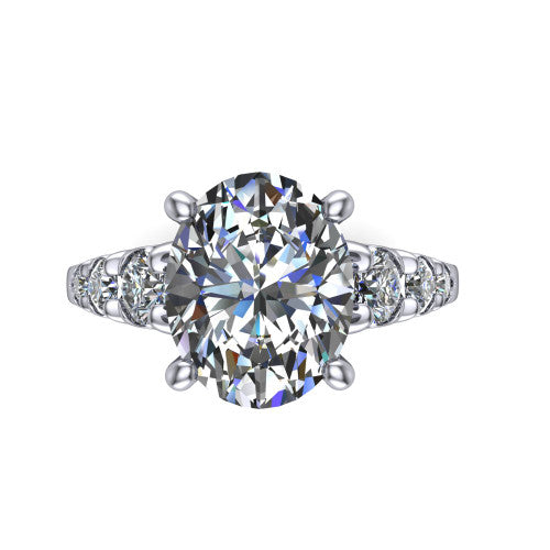 Millie oval accent engagement ring in 18K White Gold with graduated round side stones, top-down view of the center and graduated round side stones