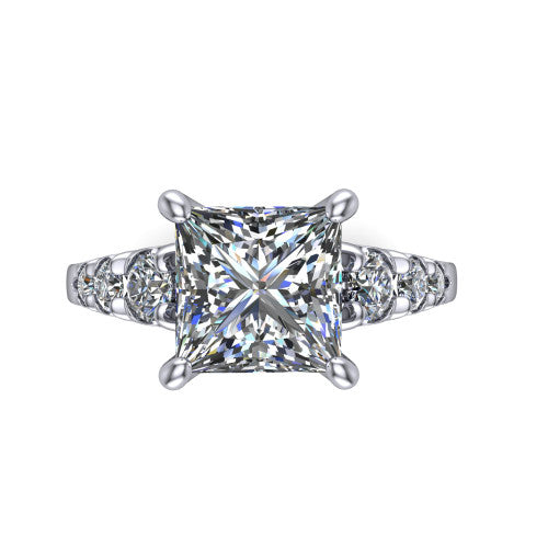 Millie princess accent engagement ring in Platinum with graduated round side stones, top-down view of the center and graduated round side stones