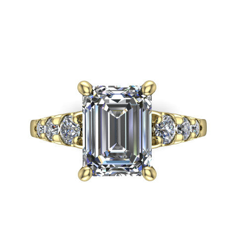 Millie emerald accent engagement ring in 18K Yellow Gold with graduated round side stones, top-down view of the center and graduated round side stones