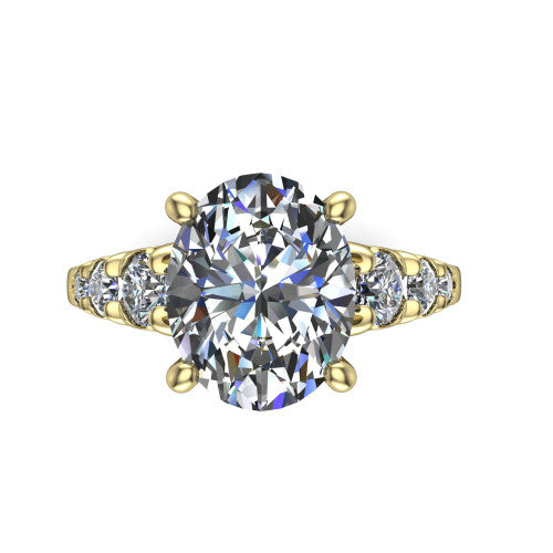 Millie oval accent engagement ring in 14K Yellow Gold with graduated round side stones, top-down view of the center and graduated round side stones