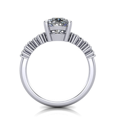 Piper pear cluster accent engagement ring in Platinum with marquise-and-round side stones, through-finger front profile