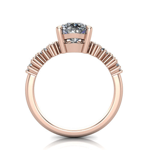 Piper pear cluster accent engagement ring in 18K Rose Gold with marquise-and-round side stones, through-finger front profile