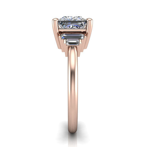 Jolene princess five stone engagement ring in 18K Rose Gold with bar-set emerald-cut side stones, side profile showing the plain band and bar-set side stones