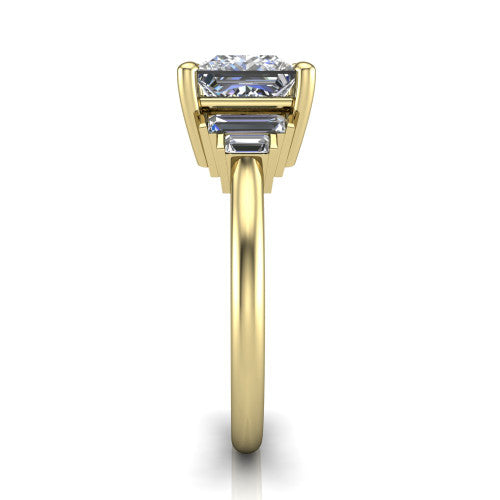 Jolene princess five stone engagement ring in 18K Yellow Gold with bar-set emerald-cut side stones, side profile showing the plain band and bar-set side stones