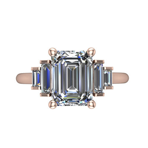 Jolene emerald five stone engagement ring in 18K Rose Gold with bar-set emerald-cut side stones, top-down view of the center and stepped emerald-cut side stones