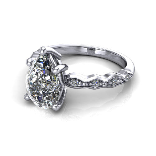 Cassie pear vintage station engagement ring in Platinum with marquise milgrain band and bezel accents, three-quarter perspective view