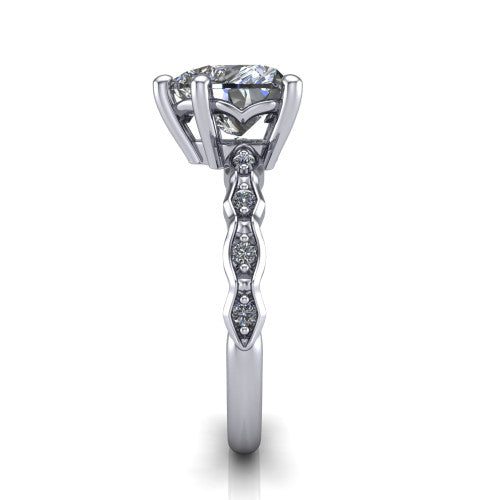 Cassie heart vintage station engagement ring in Platinum with marquise milgrain band and bezel accents, side profile showing the marquise station band and bezel accents