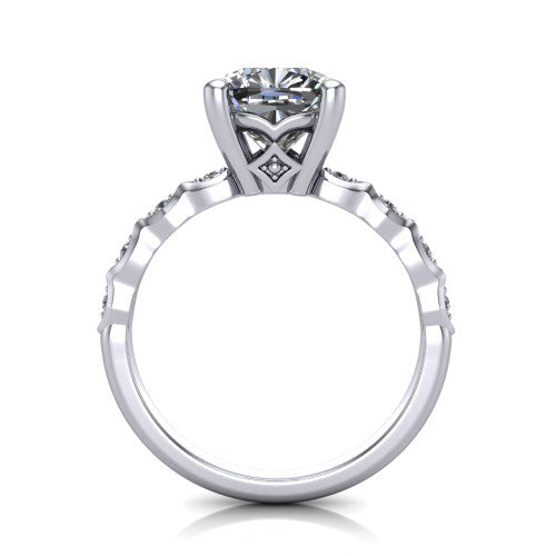 Cassie cushion vintage station engagement ring in 18K White Gold with marquise milgrain band and bezel accents, through-finger front profile showing the filigree bow gallery