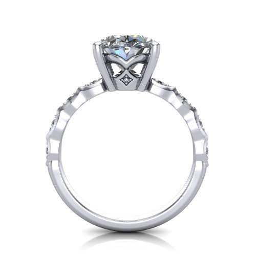Cassie oval vintage station engagement ring in Platinum with marquise milgrain band and bezel accents, through-finger front profile showing the filigree bow gallery
