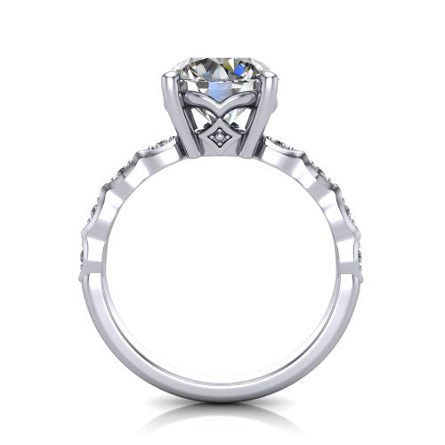 Cassie round vintage station engagement ring in Platinum with marquise milgrain band and bezel accents, through-finger front profile showing the filigree bow gallery