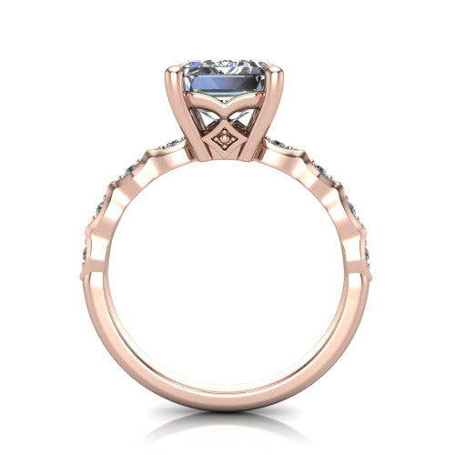 Cassie emerald vintage station engagement ring in 18K Rose Gold with marquise milgrain band and bezel accents, through-finger front profile showing the filigree bow gallery